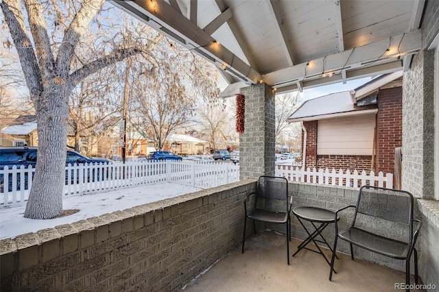 view of snow covered patio