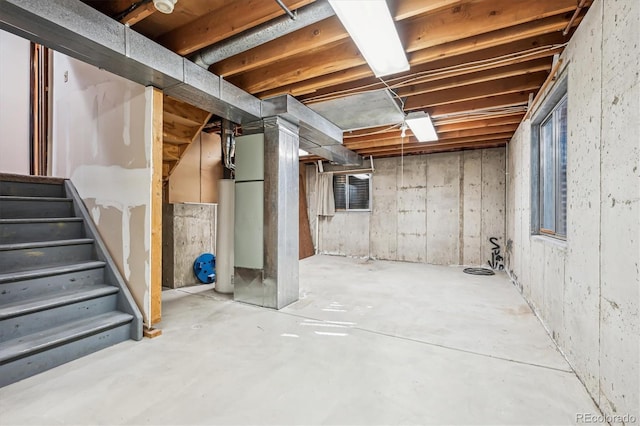 unfinished basement with stairs