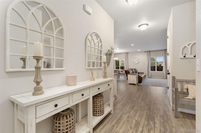 1108 Huntington Ave, Dacono, CO 80514 - hall featuring light wood-style floors and recessed lighting