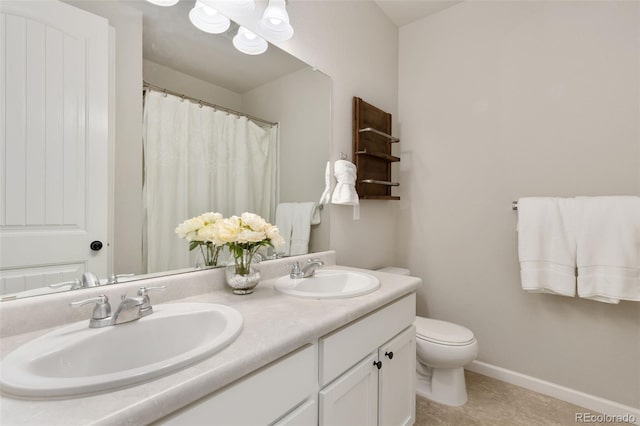 1108 Huntington Ave, Dacono, CO 80514 - bathroom with double vanity and curtained shower