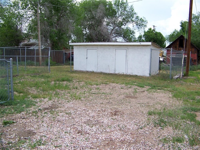 11549 Frederick St, Fort Lupton, CO 80621 - view of shed featuring fence