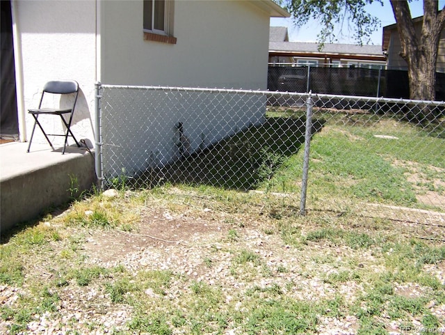 11549 Frederick St, Fort Lupton, CO 80621 - view of side of home with fence and stucco siding