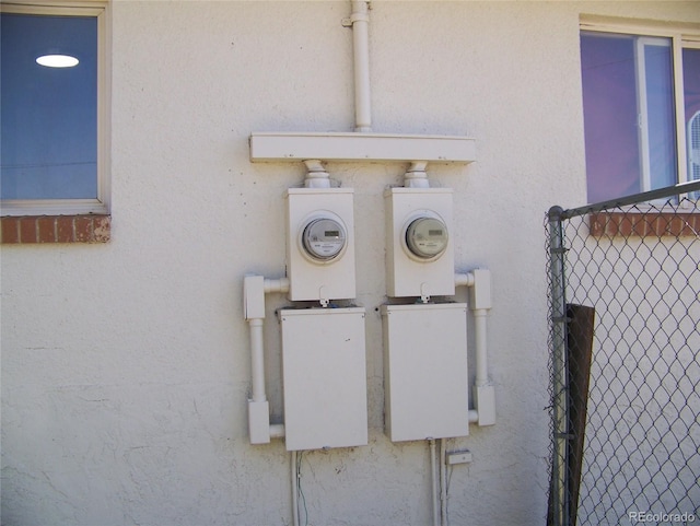 11549 Frederick St, Fort Lupton, CO 80621 - exterior view of electric meter, stucco siding, and fence