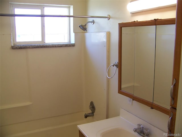11549 Frederick St, Fort Lupton, CO 80621 - bathroom with shower / bath combination and vanity