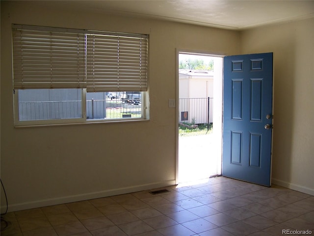 11549 Frederick St, Fort Lupton, CO 80621 - foyer with baseboards and tile patterned floors