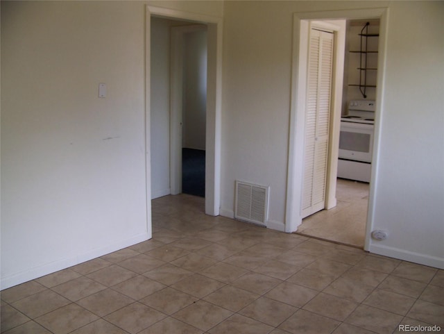 11549 Frederick St, Fort Lupton, CO 80621 - spare room with light tile patterned floors and baseboards