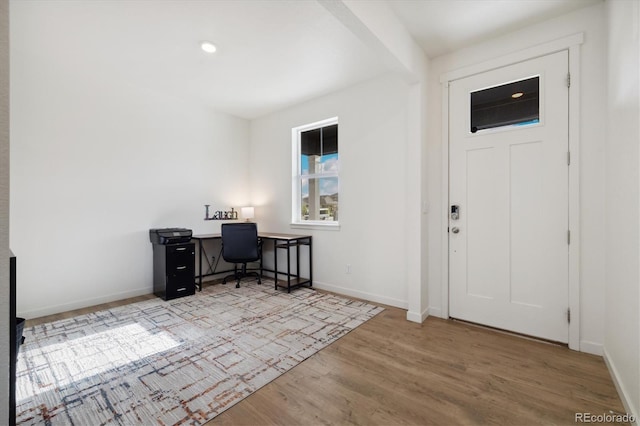 353 Raven Ln, Johnstown, CO 80534 - foyer entrance with wood finished floors and baseboards