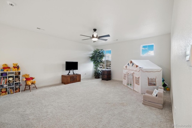 353 Raven Ln, Johnstown, CO 80534 - playroom featuring ceiling fan, carpet flooring, and baseboards