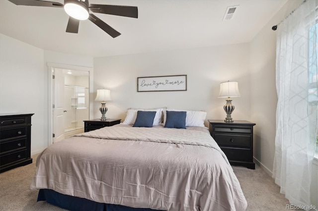 353 Raven Ln, Johnstown, CO 80534 - bedroom featuring light colored carpet, ensuite bath, ceiling fan, and baseboards