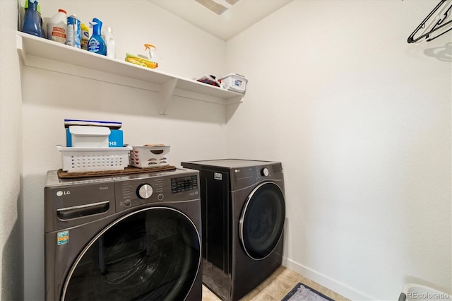 353 Raven Ln, Johnstown, CO 80534 - washroom with washer and clothes dryer, baseboards, and light tile patterned floors