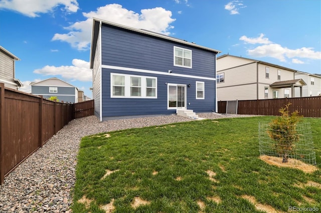 353 Raven Ln, Johnstown, CO 80534 - rear view of house featuring entry steps
