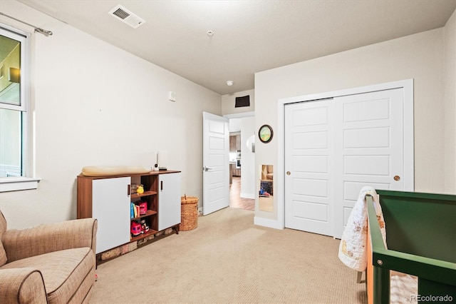 playroom with light colored carpet