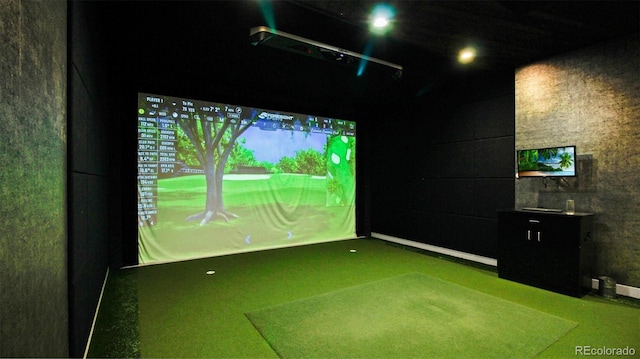 recreation room with golf simulator