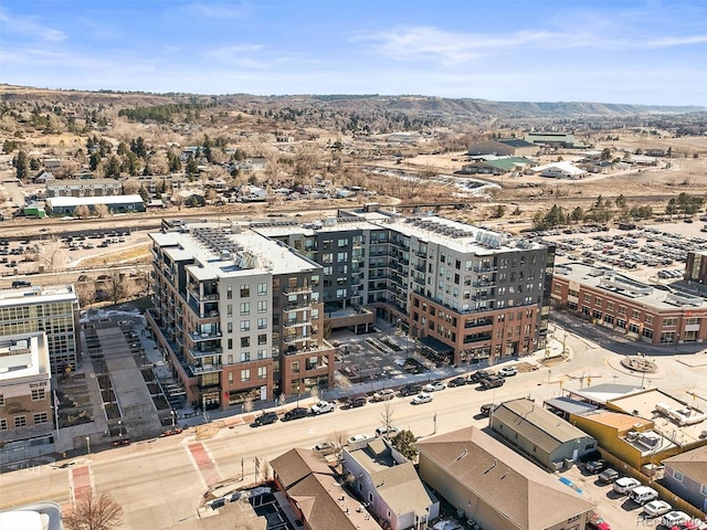 birds eye view of property featuring a mountain view