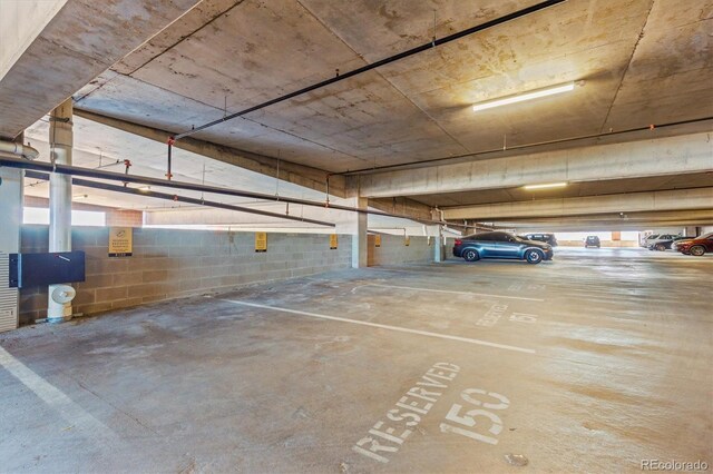 20 Wilcox St Unit 517, Castle Rock, CO 80104 - parking deck featuring concrete block wall