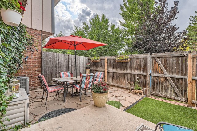 view of patio featuring central AC