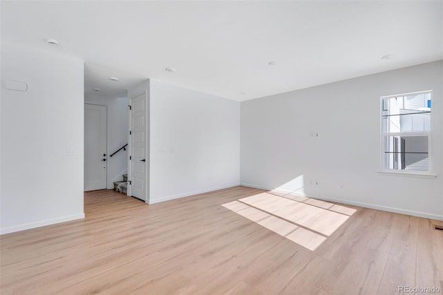 empty room featuring light hardwood / wood-style floors