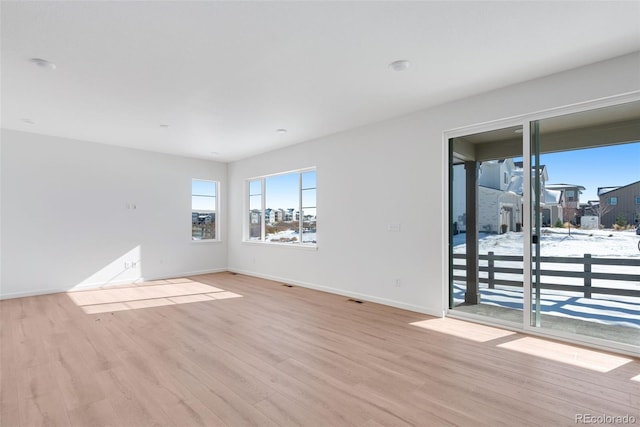 empty room featuring light hardwood / wood-style floors