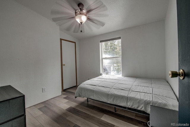 492 Kimmes Ln, Breckenridge, CO 80424 - bedroom with wood finished floors and ceiling fan