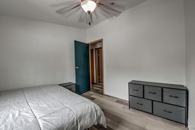 492 Kimmes Ln, Breckenridge, CO 80424 - bedroom featuring light wood-type flooring and ceiling fan