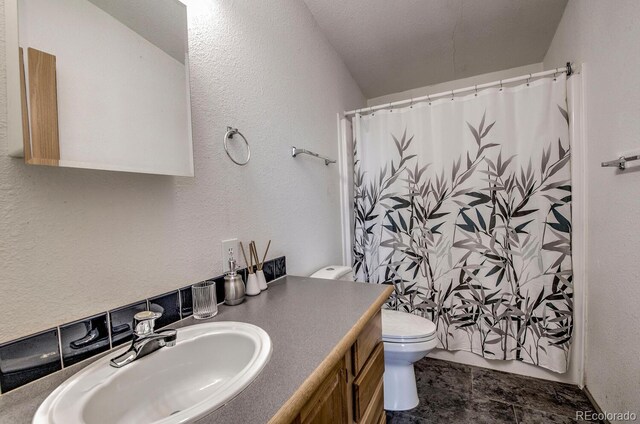 492 Kimmes Ln, Breckenridge, CO 80424 - full bath with toilet, vanity, a textured wall, and curtained shower