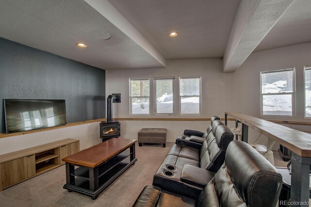 492 Kimmes Ln, Breckenridge, CO 80424 - living area featuring a wood stove, light colored carpet, and recessed lighting
