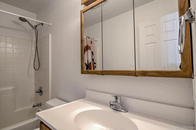 492 Kimmes Ln, Breckenridge, CO 80424 - bathroom with vanity, shower / tub combo, and toilet