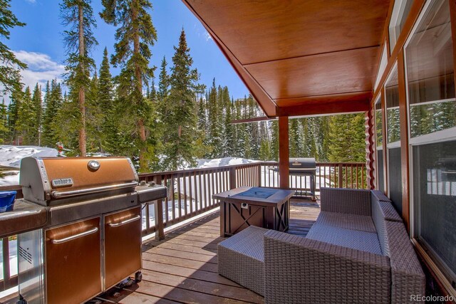 492 Kimmes Ln, Breckenridge, CO 80424 - deck with a wooded view and grilling area