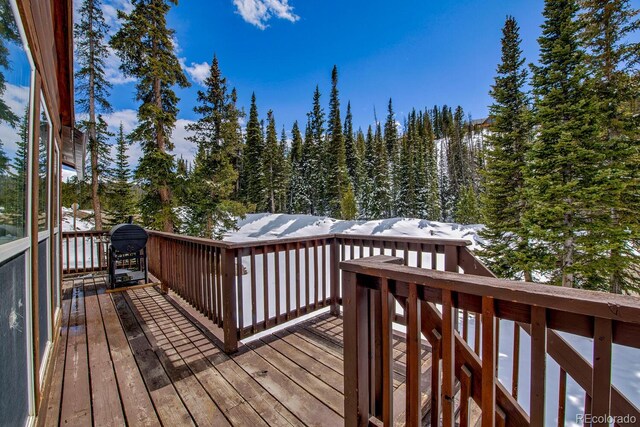 492 Kimmes Ln, Breckenridge, CO 80424 - snow covered deck with a forest view