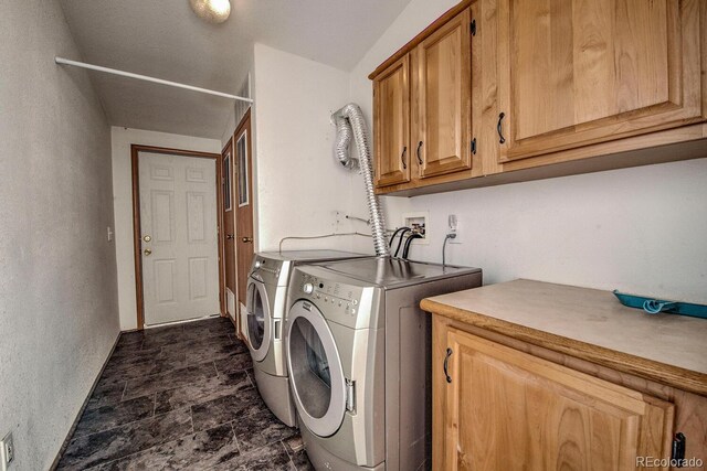 492 Kimmes Ln, Breckenridge, CO 80424 - washroom featuring cabinet space and washing machine and dryer