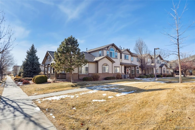 view of front of home with a front lawn