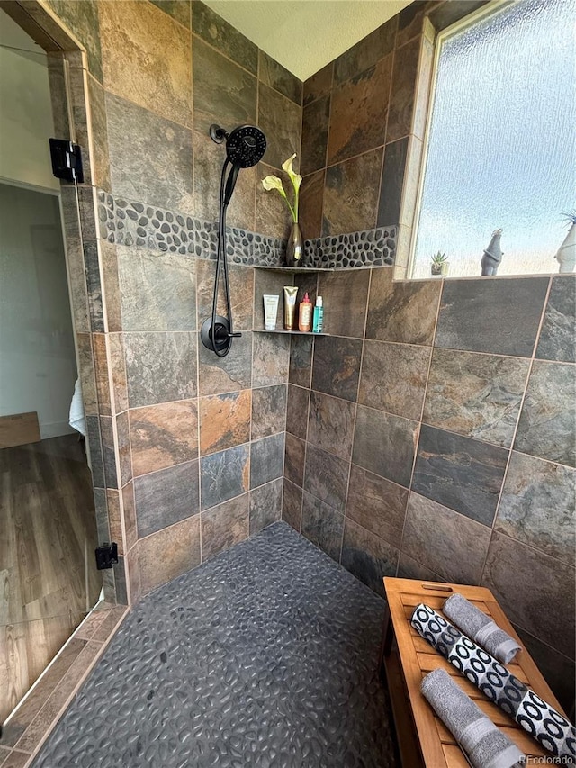 653 Glenarbor Cir, Longmont, CO 80504 - full bath with a tile shower and wood finished floors