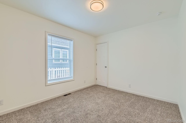 6261 Red Cedar St, Frederick, CO 80530 - unfurnished room with baseboards, visible vents, and light colored carpet