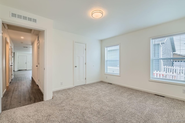 6261 Red Cedar St, Frederick, CO 80530 - unfurnished room featuring carpet, visible vents, and a healthy amount of sunlight