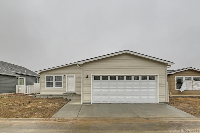 6261 Red Cedar St, Frederick, CO 80530 - single story home featuring driveway and a garage