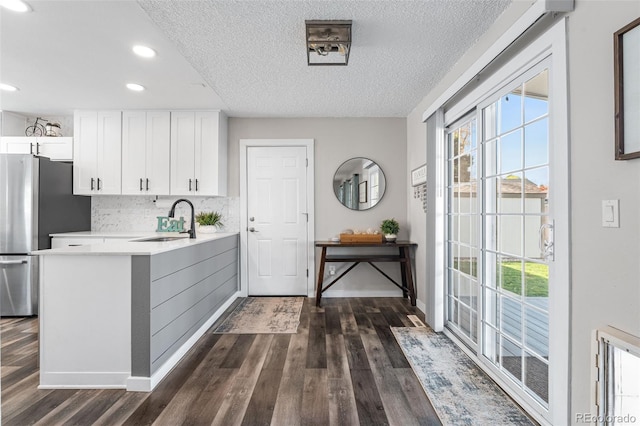 4733 S Vivian Ct, Morrison, CO 80465 - kitchen featuring a sink, freestanding refrigerator, dark wood-style flooring, recessed lighting, and light countertops