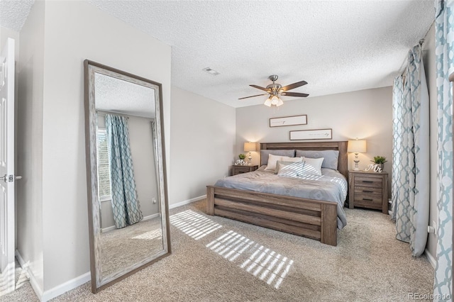 4733 S Vivian Ct, Morrison, CO 80465 - bedroom featuring carpet floors, a textured ceiling, baseboards, and a ceiling fan