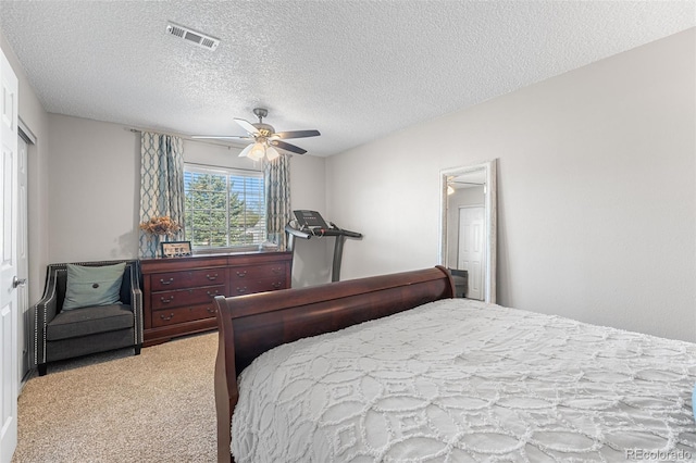 4733 S Vivian Ct, Morrison, CO 80465 - bedroom with light colored carpet, a textured ceiling, and a ceiling fan