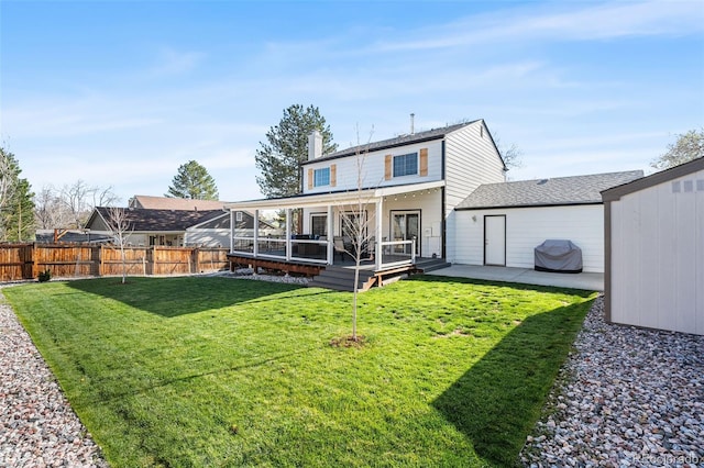 4733 S Vivian Ct, Morrison, CO 80465 - back of house with a deck, a patio area, and a chimney