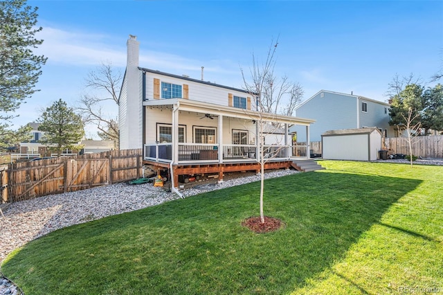 4733 S Vivian Ct, Morrison, CO 80465 - back of property featuring a ceiling fan, a deck, and a chimney