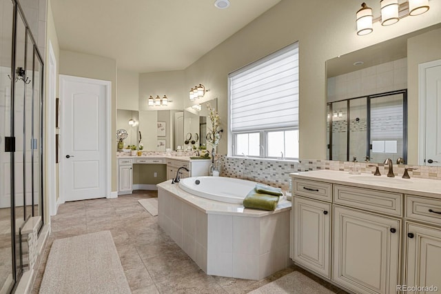 bathroom featuring tile patterned flooring, vanity, separate shower and tub, and decorative backsplash