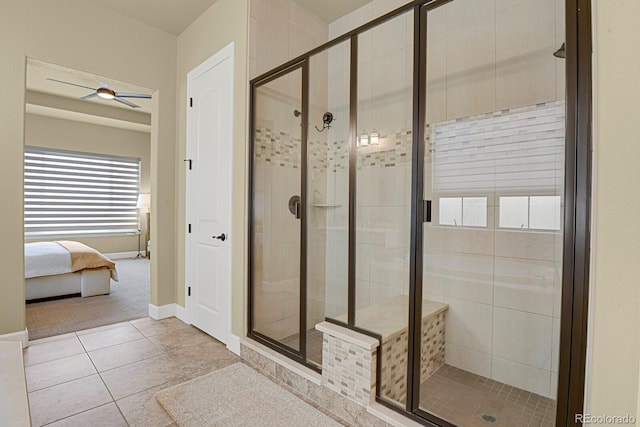 bathroom with an enclosed shower, tile patterned floors, and ceiling fan