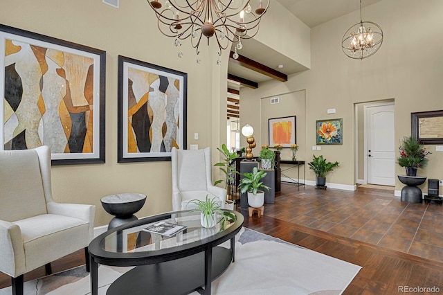 sitting room with an inviting chandelier