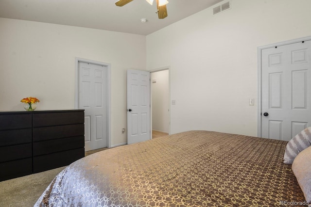 bedroom featuring carpet, ceiling fan, and lofted ceiling