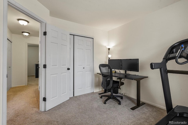 office area with baseboards and carpet