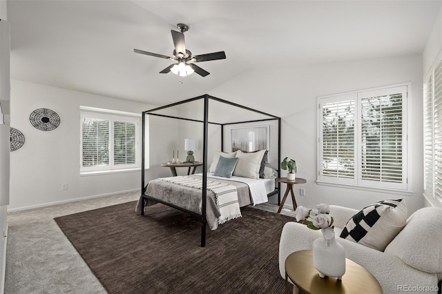 bedroom featuring carpet, lofted ceiling, and ceiling fan