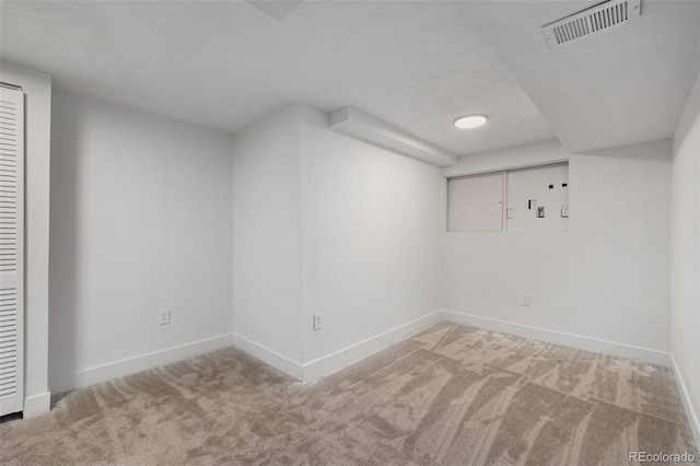 unfurnished room featuring carpet floors