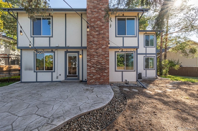 back of house featuring a patio area