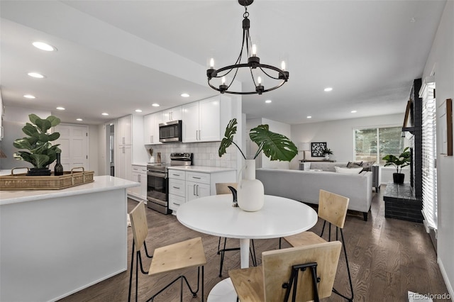 dining room featuring dark hardwood / wood-style floors