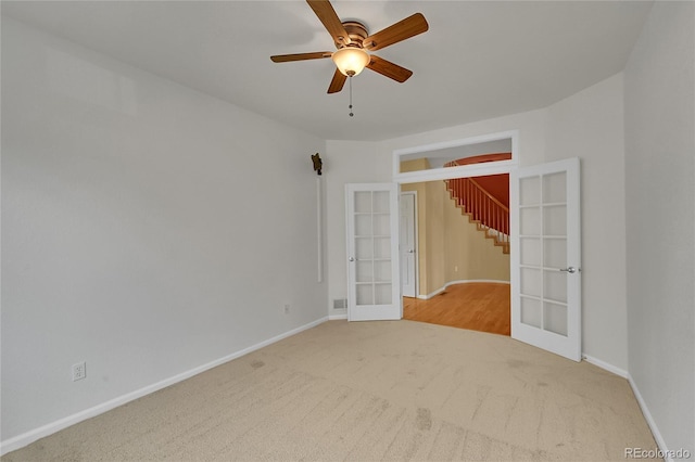 3590 S Malaya St, Aurora, CO 80013 - empty room with french doors, baseboards, carpet floors, and a ceiling fan